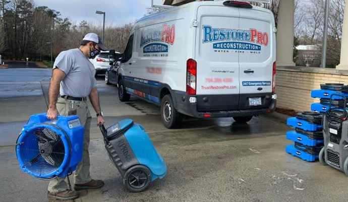 RestorePro service van and technician