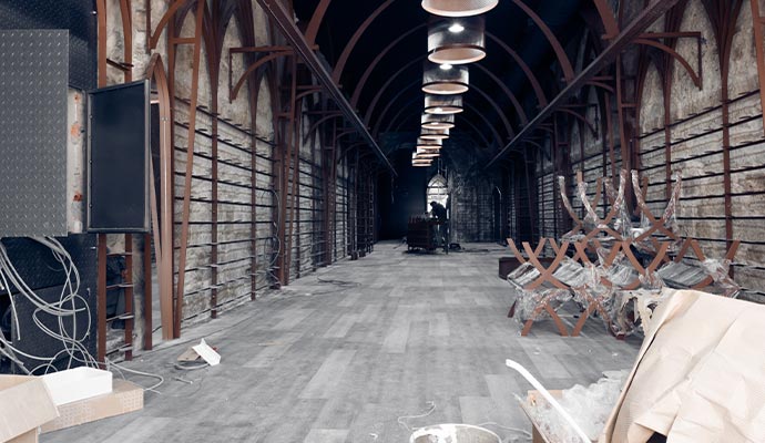 A cathedral-like restaurant interior under reconstruction
