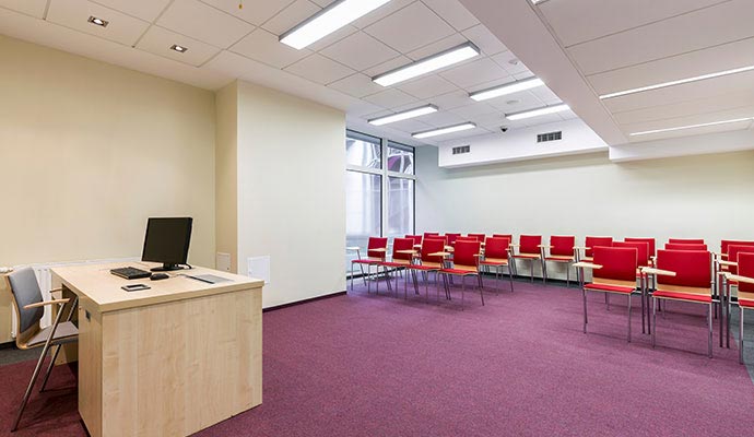 A clean Carpeted college classroom