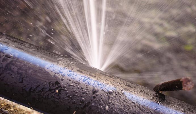 A broken pipe leaking water