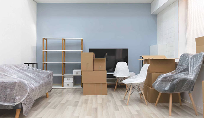 Modern living room with moving boxes