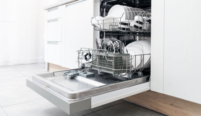 Clean dishwasher with utensils