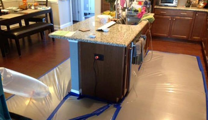 Floor drying system for kitchen water damage