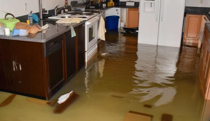 Kitchen with severe flood water damage