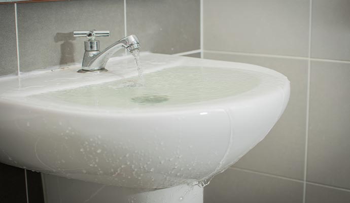 Bathroom Sink Overflow Cleanup in Charlotte