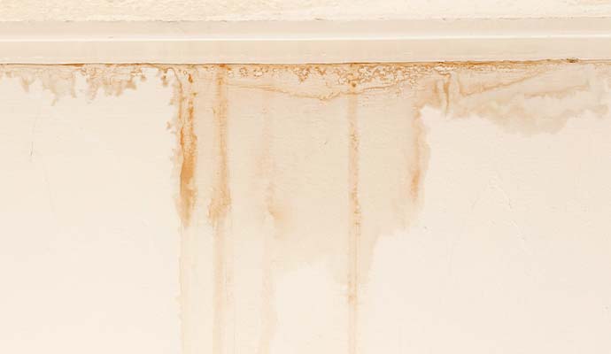 Visible water stains and discoloration on a wall